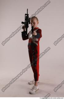 DENISA WITH TWO GUNS